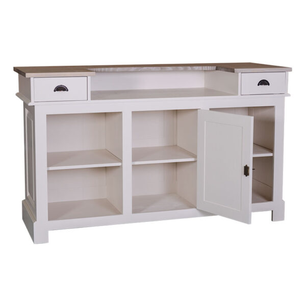 Modern landelijke eiken balie/toonbank met 2 lades, 1 kastje en 4 vakken voor opberg. De volledige kast is in de kleur tarwe en het bovenblad is dennenhout in de kleur waterafstotend finish bruin. Villa Laura