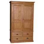landelijke klassieke kledingkast met lades en 2 deuren. de kledingkast heeft een gedeelte hang en legplanken. Gemaakt van massief hout eiken in de kleur bruin. Het kan op maat gemaakt worden. Villa Laura