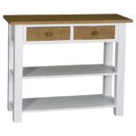 Landelijke side table met twee lades en twee planken. Gemaakt van massief eiken hout in de kleur wit met naturel. Het meubel kan op verschillende manieren geverfd worden in verschillende kleuren en kan op maat gemaakt worden. Villa Laura