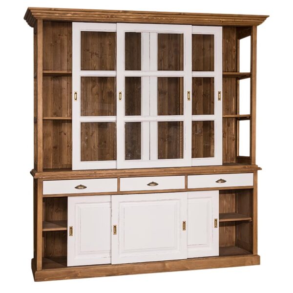 Landelijke buffetkast met zes schuifdeuren en drie lades. De onderkant van de kast zie je 3 schuifdeuren met daarboven 3 lades. De bovenkant van de kast heeft drie lange schuifdeuren met glas. Gemaakt van massief eiken hout in de kleur wax finish bruin met witte deuren en lades. De buffetkast kan op verschillende manieren geverfd worden in verschillende kleuren en kan op maat gemaakt worden. Villa Laura