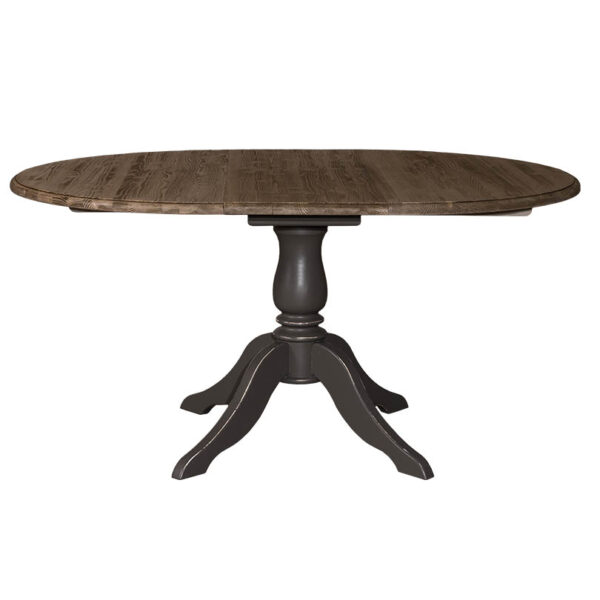 Landelijke uitschuifbare ronde eettafel met een klassiek onderstel. Eettafel gemaakt van eikenhout. Onderstel in de kleur zwartbruin en het tafelblad in de kleur koffie. Villa Laura