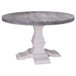 Landelijke ronde tafel met groot onderstel met eiken houten blad die op maat gemaakt kan worden. Het tafelblad is in de kleur donkerrustiek met white wash. Het onderstel is in de kleur gebroken wit. Villa Laura