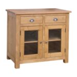 Landelijke houten keukenkast met 2 diepe lades en deurtjes van 100 cm breed. Dit is een onderdeel van een samenstelling. De kast kan op maat gemaakt worden. In de kleur naturel eiken met komgrepen. Verkrijgbaar bij Villa Laura